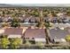 Aerial view of the homes in a charming suburban neighborhood with mature trees and well-maintained landscaping at 7021 Feather Pine St, Las Vegas, NV 89131