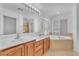 Bright bathroom boasts double sinks and a garden tub at 7621 Breed Hill St, Las Vegas, NV 89149