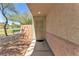 Inviting entryway with security door leading to a well-maintained home and community park at 7621 Breed Hill St, Las Vegas, NV 89149