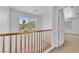 Upstairs hallway overlooking a view with railing at 7621 Breed Hill St, Las Vegas, NV 89149