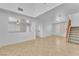 Light and airy living room with tile flooring, open layout, and natural light at 7621 Breed Hill St, Las Vegas, NV 89149