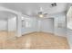 Bright living room features tile flooring, ceiling fan, and generous natural light at 7621 Breed Hill St, Las Vegas, NV 89149