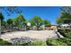Community basketball court surrounded by mature shade trees and landscaping at 8949 Merry Mullion Ct, Las Vegas, NV 89149
