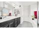 Bright bathroom featuring double sinks, modern fixtures, and a clean, contemporary design at 8949 Merry Mullion Ct, Las Vegas, NV 89149