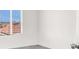 Bright, empty bedroom with a window, ready for your personal touch at 8949 Merry Mullion Ct, Las Vegas, NV 89149