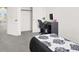Comfortable bedroom with a dedicated study area, perfect for work or school at 8949 Merry Mullion Ct, Las Vegas, NV 89149