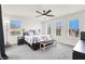 Spacious main bedroom with natural light, ceiling fan, and modern furnishings at 8949 Merry Mullion Ct, Las Vegas, NV 89149
