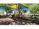 Community playground featuring shade structure, slides, and climbing features for neighborhood enjoyment at 8949 Merry Mullion Ct, Las Vegas, NV 89149