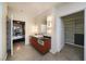 Modern bathroom with sleek vanity, large mirror, and stylish lighting fixtures, adjacent to closet at 900 Las Vegas Blvd # 912, Las Vegas, NV 89101
