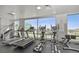 Bright gym with treadmills, ellipticals, and city views from the large windows at 900 Las Vegas Blvd # 912, Las Vegas, NV 89101