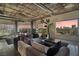 Open-concept living space with city views, modern furnishings, and industrial style accents at 900 Las Vegas Blvd # 912, Las Vegas, NV 89101