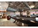 Open living area with pool table, modern kitchen, and skyline views for entertainment at 900 Las Vegas Blvd # 912, Las Vegas, NV 89101