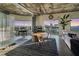 Open floor plan with dining area, office, and living room featuring cityscape views at 900 Las Vegas Blvd # 912, Las Vegas, NV 89101