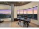 Bright office space with large windows showcasing a stunning city view and modern desk at 900 Las Vegas Blvd # 912, Las Vegas, NV 89101