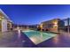 Rooftop pool overlooking city lights with lounge chairs for relaxation at 900 Las Vegas Blvd # 912, Las Vegas, NV 89101