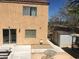 View of home's backyard featuring patio area, mature trees, storage shed, and green house at 9175 Titan Hill Ct, Las Vegas, NV 89148