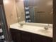 Bathroom features double sink and large mirror at 9175 Titan Hill Ct, Las Vegas, NV 89148