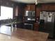 Well-equipped kitchen features stainless steel appliances and plentiful counter space at 9175 Titan Hill Ct, Las Vegas, NV 89148