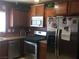 Well-equipped kitchen features stainless steel appliances and plentiful cabinet space at 9175 Titan Hill Ct, Las Vegas, NV 89148