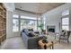 Comfortable living room showcasing natural light, wood floors, modern ceiling, and golf course views at 9425 Villa Ridge Dr, Las Vegas, NV 89134