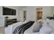 Luxurious bedroom featuring an entertainment center with a flatscreen tv at 9425 Villa Ridge Dr, Las Vegas, NV 89134