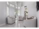 Bright and airy living room with lots of natural light and access to kitchen at 9440 Grenville Ave, Las Vegas, NV 89134