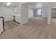 Bright, open living room with access to balcony and modern kitchen at 950 Seven Hills Dr # 217, Henderson, NV 89052