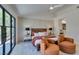 Modern main bedroom featuring ample natural light, stylish decor, and comfortable seating at 9520 Sundial Dr, Las Vegas, NV 89134
