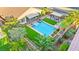 Aerial view showcasing the pool, spa, covered patios, lush landscaping and privacy at 9685 Stonily Ln, Las Vegas, NV 89178