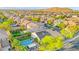 Aerial view of a home featuring pool, spa, covered patios, and desert landscaping at 9685 Stonily Ln, Las Vegas, NV 89178