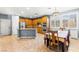 Eat-in kitchen features stainless steel appliances, tile floors, and lots of natural light at 9685 Stonily Ln, Las Vegas, NV 89178