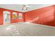 Open living space featuring carpeted floors, a ceiling fan, and access to the kitchen at 9685 Stonily Ln, Las Vegas, NV 89178