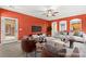 Inviting living room with cozy seating, large windows, and stylish decor, creating a comfortable ambiance at 9685 Stonily Ln, Las Vegas, NV 89178
