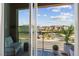 View from the balcony featuring outdoor seating, decor and a beautiful neighborhood at 9743 Mojave Mountain St, Las Vegas, NV 89166