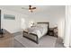 Bright bedroom with a ceiling fan, and a plush bed with neutral tones at 9743 Mojave Mountain St, Las Vegas, NV 89166