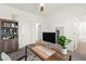 Bright office room featuring a desk, a bookshelf, and multiple doors at 9743 Mojave Mountain St, Las Vegas, NV 89166