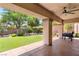 Covered patio and landscaped backyard, perfect for outdoor living at 9747 Cathedral Pines Ave, Las Vegas, NV 89149