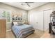 Bedroom features plantation shutters, white closet doors, and carpet at 9747 Cathedral Pines Ave, Las Vegas, NV 89149