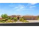 Stunning single-story home featuring a tile roof, manicured landscaping and a three car garage at 9747 Cathedral Pines Ave, Las Vegas, NV 89149