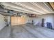 The spacious garage featuring organized storage solutions and ample room for vehicles at 9785 W Meranto Ave, Las Vegas, NV 89178