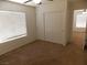 Bedroom features a ceiling fan, natural light, and a closet creating a serene and comfortable atmosphere at 1018 Sun Poppy Ave, Las Vegas, NV 89123