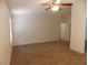 Bedroom with a ceiling fan, two interior doors and a window at 1018 Sun Poppy Ave, Las Vegas, NV 89123