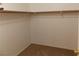 Walk-in closet with shelving and hanging rod for storage at 1018 Sun Poppy Ave, Las Vegas, NV 89123