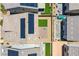 An aerial view highlights the home's solar panels and backyard patio with artificial turf at 10435 Rose Palisade St, Las Vegas, NV 89141