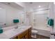 Bathroom features a shower-tub combo and a sleek vanity at 10435 Rose Palisade St, Las Vegas, NV 89141