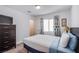 Bright bedroom with closet and window at 10435 Rose Palisade St, Las Vegas, NV 89141