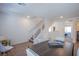 Dining area showcases staircase access and a view of the living space at 10435 Rose Palisade St, Las Vegas, NV 89141