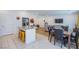 Open kitchen/living area with stainless steel appliances, granite countertops, and hardwood flooring at 10435 Rose Palisade St, Las Vegas, NV 89141