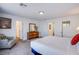 Comfortable main bedroom with neutral colors and ensuite access at 10435 Rose Palisade St, Las Vegas, NV 89141