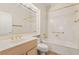 Bathroom with vanity sink, toilet, and shower over tub with gold trim at 10548 Findlay Ave, Las Vegas, NV 89134